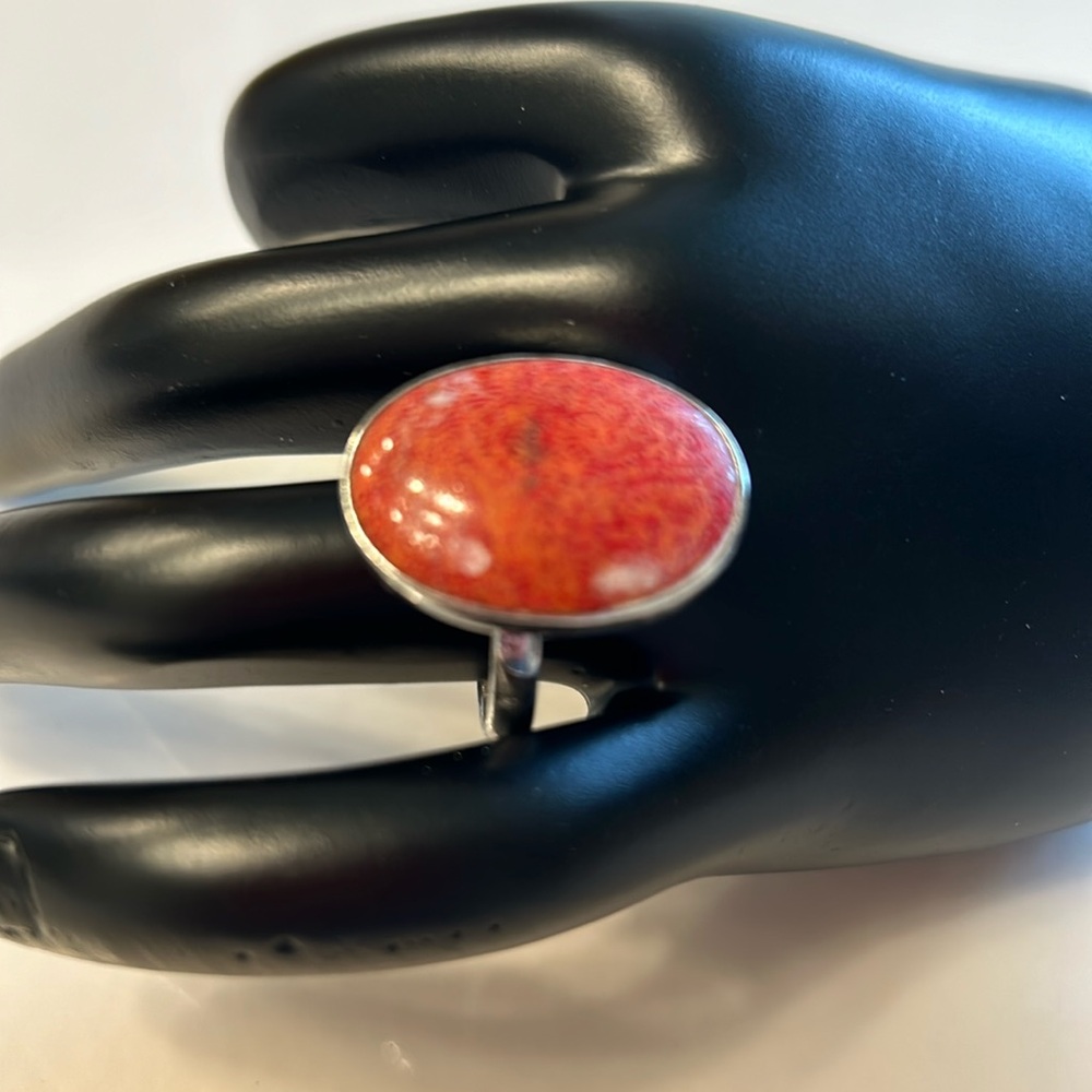 Oval Sterling Silver with Persimmon Red toned Stone- size adjustable